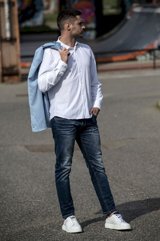 Jeans uomo con gocce arancio outside