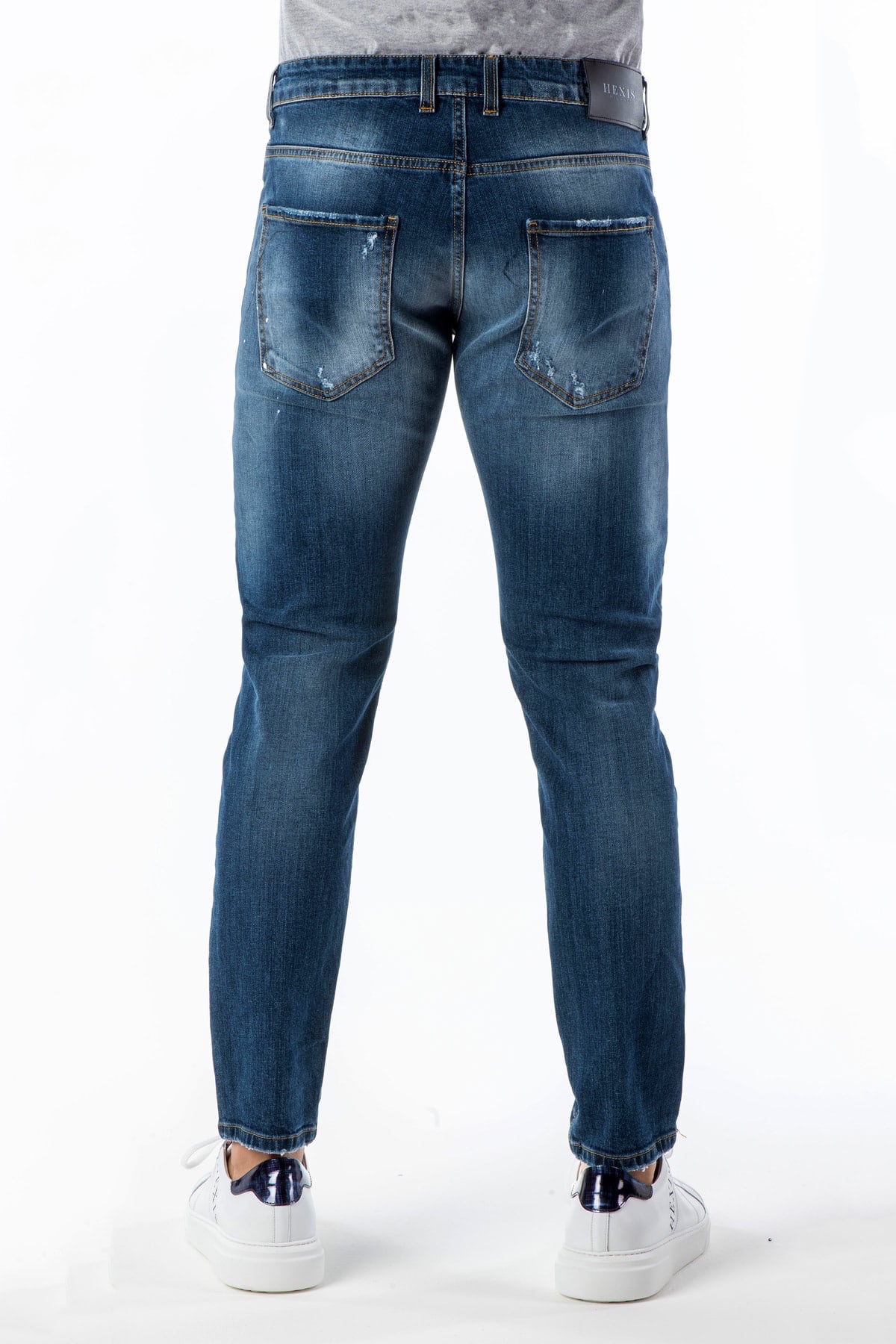 Jeans uomo skinny con strappi back